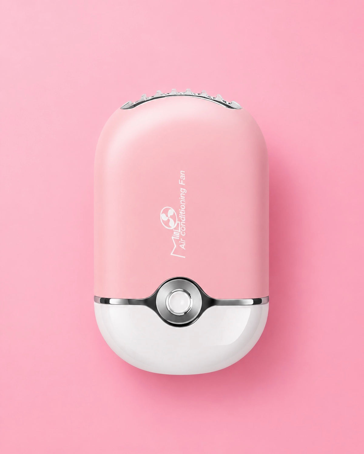 A pink and white handheld electric facial cleansing brush with a Pokéball-inspired design, featuring a silver button and LED light bar on top. Pink or Black Portable Mini Lash Fan for Eyelash Extensions Bratty Beauty XO